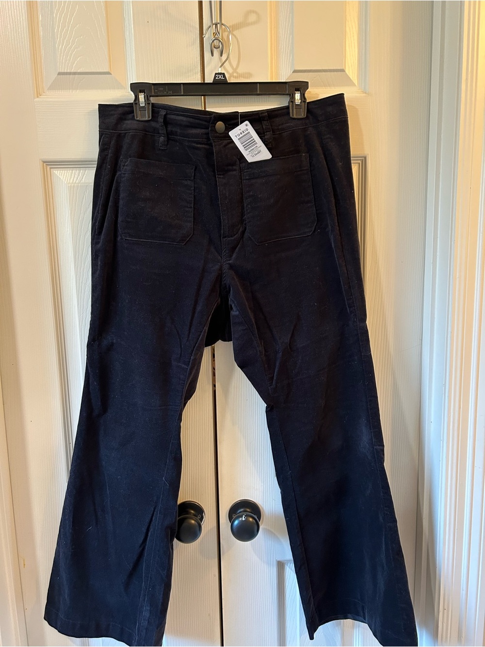 Torrid straight leg black velvet pants size 12 short